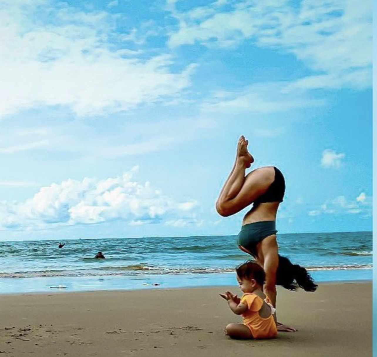Xuan doing yoga on the beach
